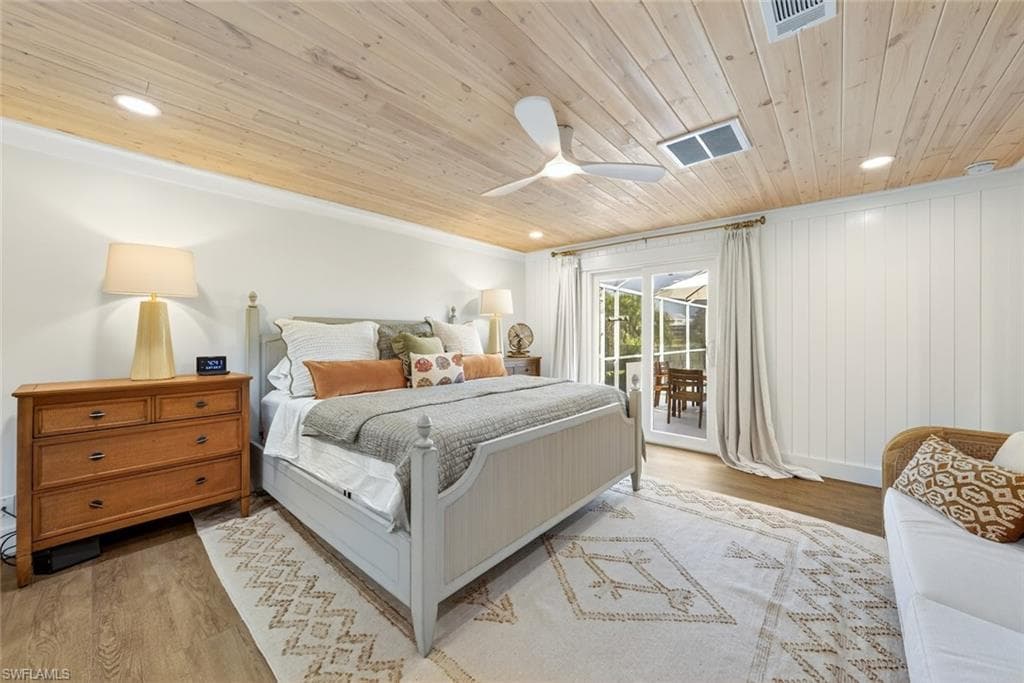 Wood-finish flooring with a light wood plank ceiling