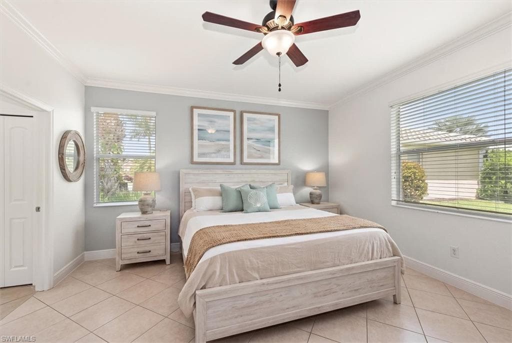 Virtually staged primary bedroom showing one possible furniture layout.