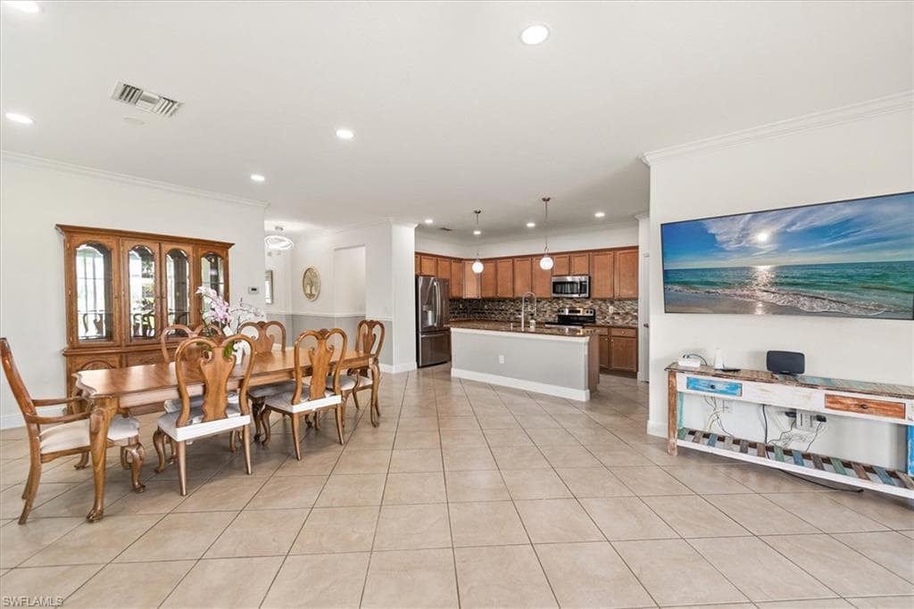 Dining area positioned near the kitchen with a comfortable connection to the main living area.