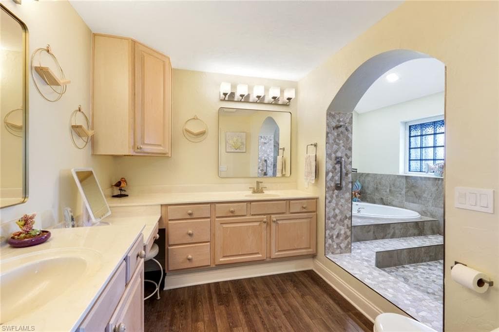 Large double vanities, walk in shower and jetted tub.