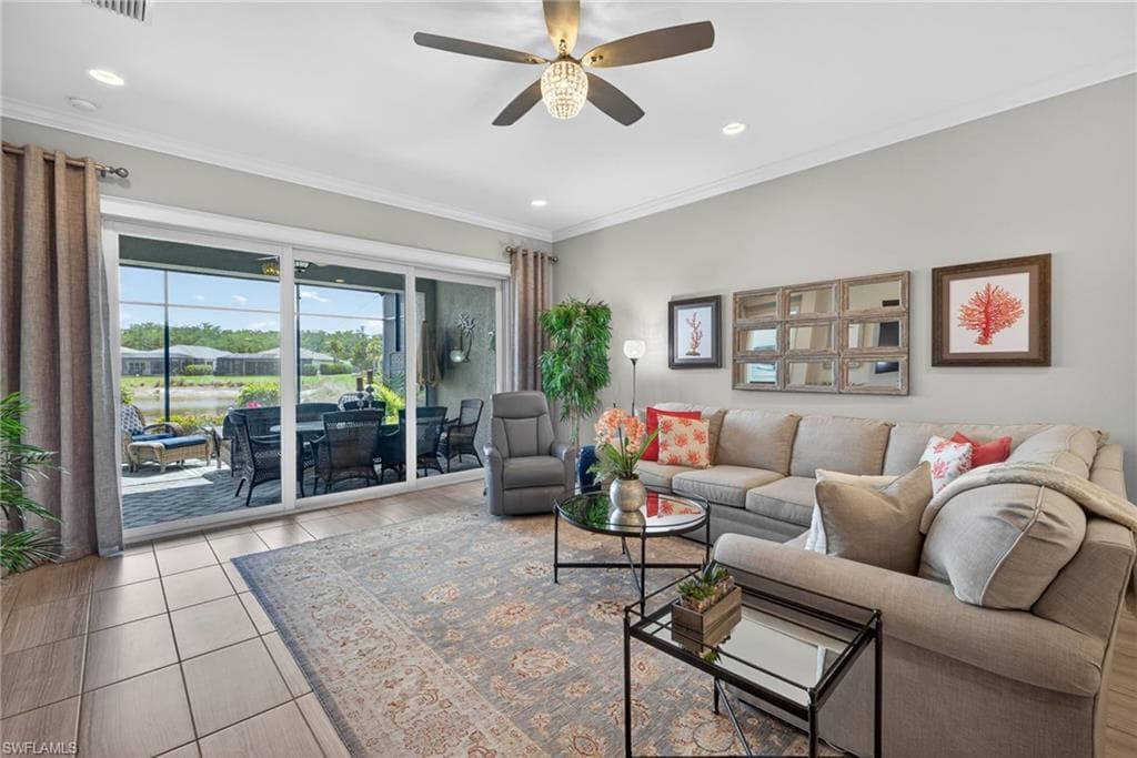 Great room opens off of kitchen and flows into THE maximum allowable expansion of lania for villas...and the cage was expanded as well!
