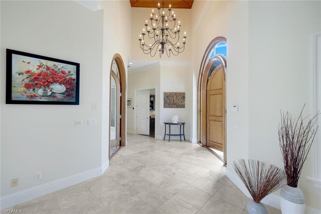 Foyer w/ Dramatic 14-Ft. Ceiling & Curated Chandelier