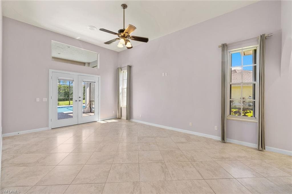 Kitchen with wood-finish cabinetry, granite countertops, and built-in appliances
