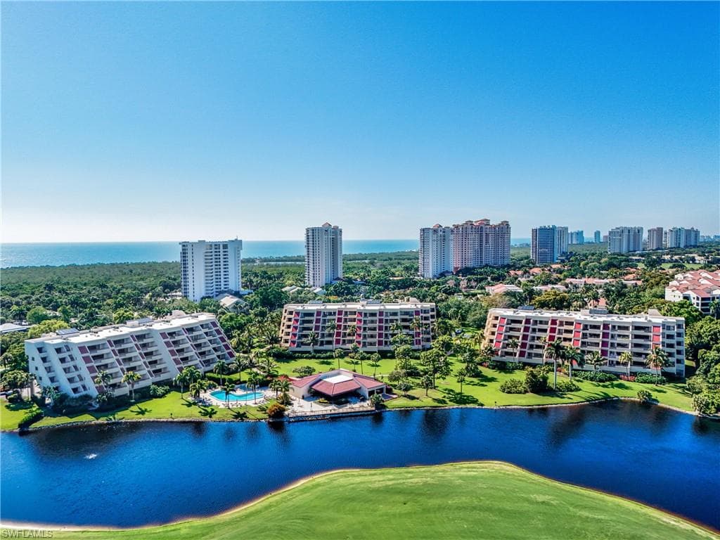 Aerial perspective highlighting Hyde Park’s prime location near the beach, clubhouse amenities, and scenic lakeside surroundings.