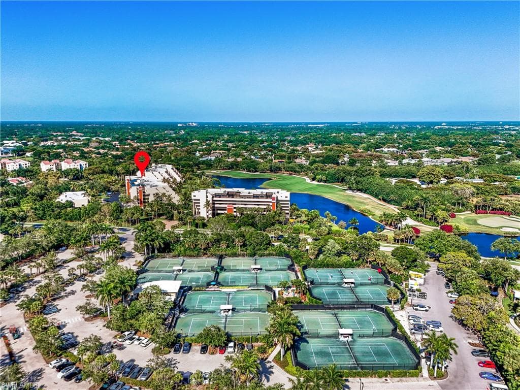Prime location with close proximity to Pelican Bay Foundation tennis courts and surrounding amenities.