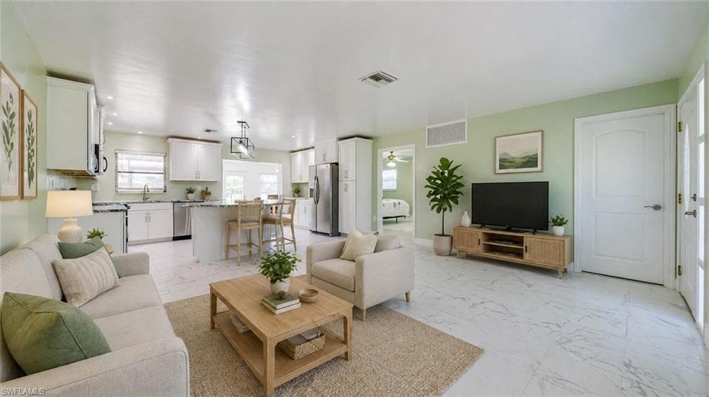 Virtually Staged - Great Room with View of Kitchen