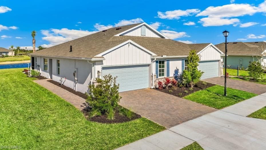 Model home - Modern stucco exterior with board and batten accents