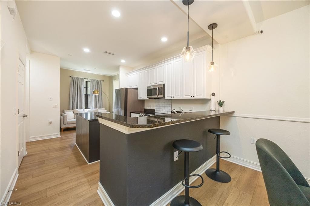 DINING AREA VIEW TO KITCHEN