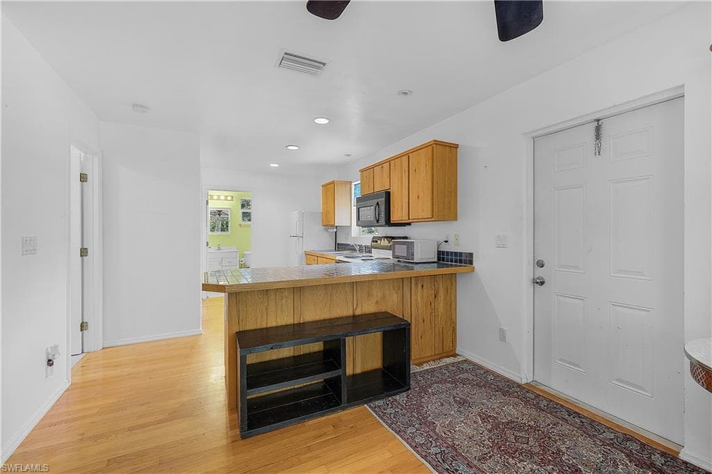 7322 Hibiscus AVE photo 9 of 25