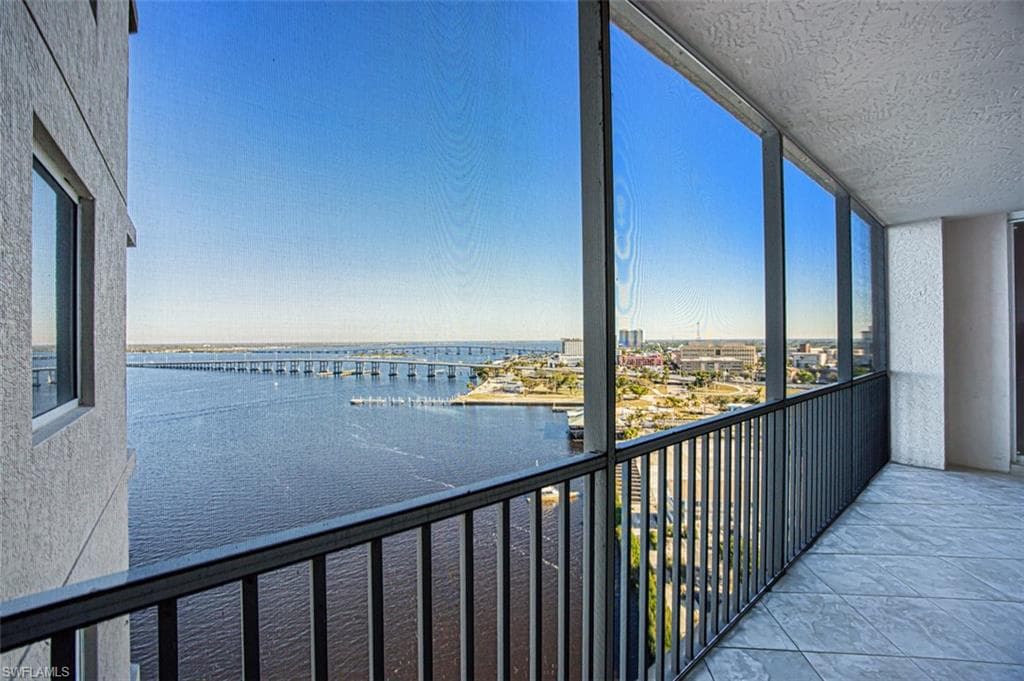 Balcony featuring a water view