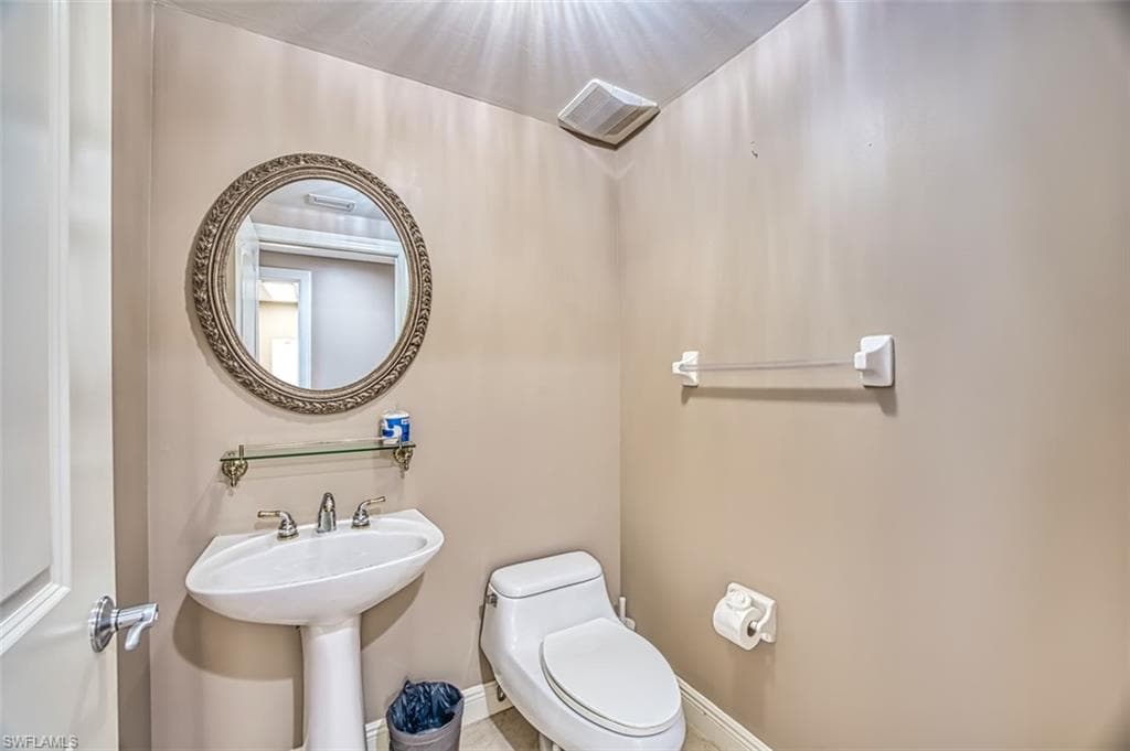 Bathroom with sink and toilet