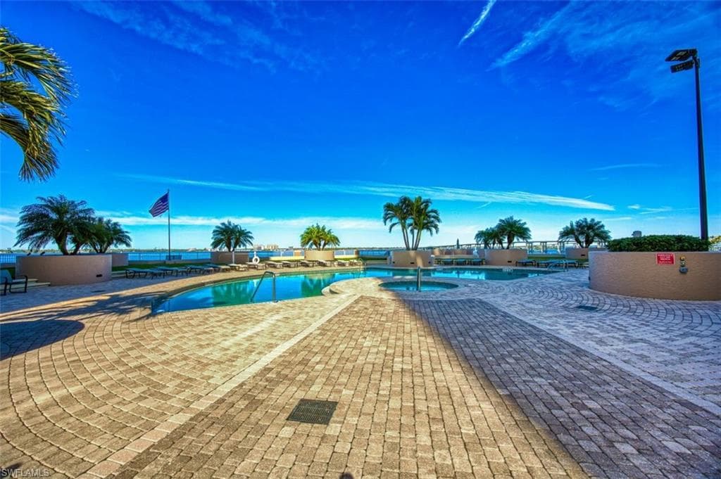 View of pool with a patio area