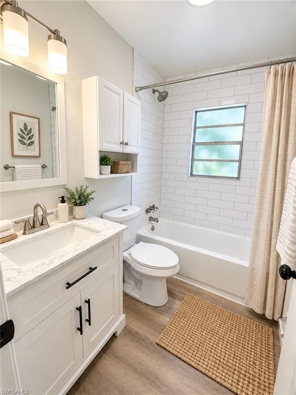 White vanity with a single basin sink, white countertop, and black hardware