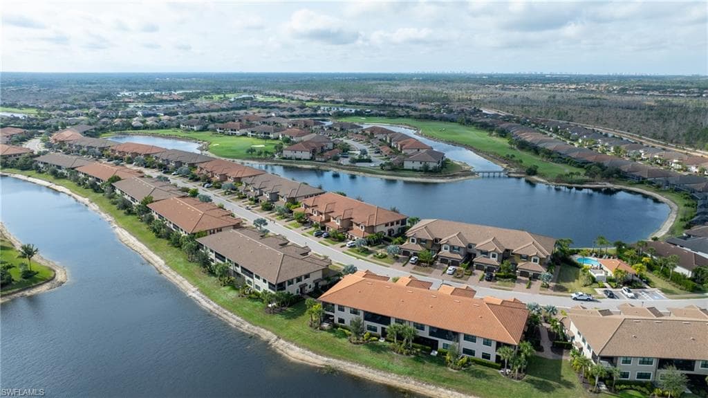 Aerial view of residential area with a large body of water
