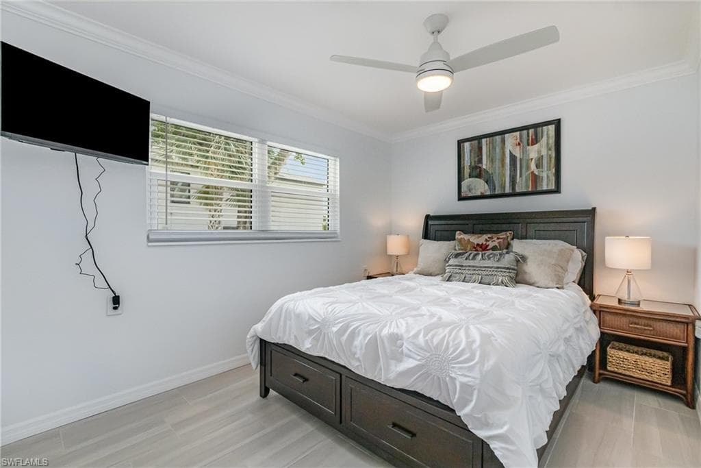 Master bedroom with wood-look tile flooring!