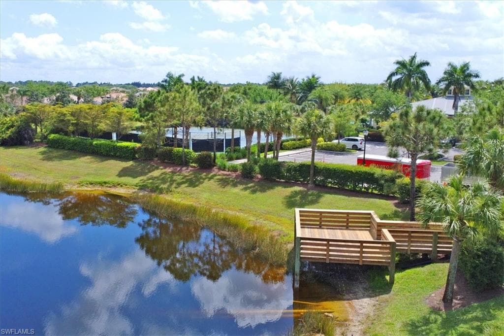 View of community with a water view
