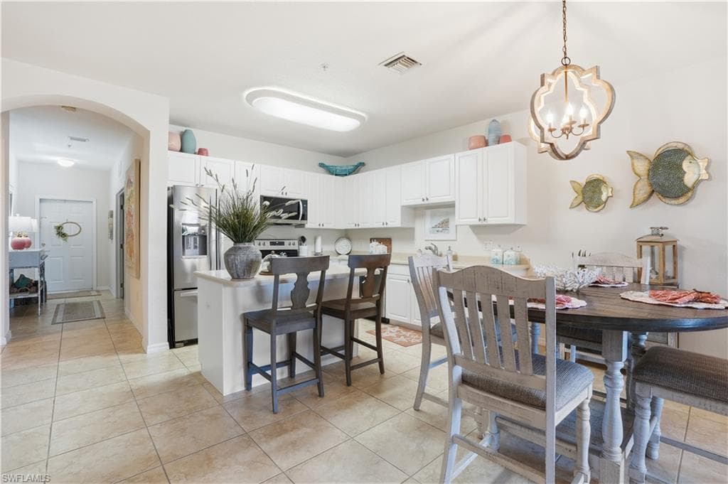 The breakfast bar serves as a casual dining spot.