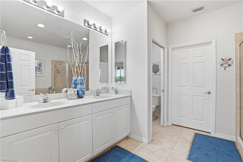 Primary ensuite with dual sinks.