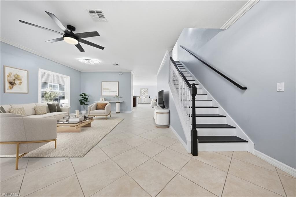 Open-concept living space featuring expansive tile flooring throughout