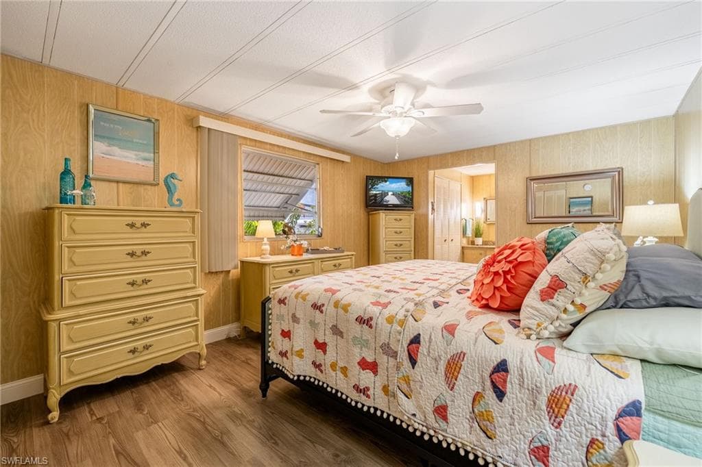 Expansive space with 3 closets. This is a king size bed with 3 dressers plus nightstands!