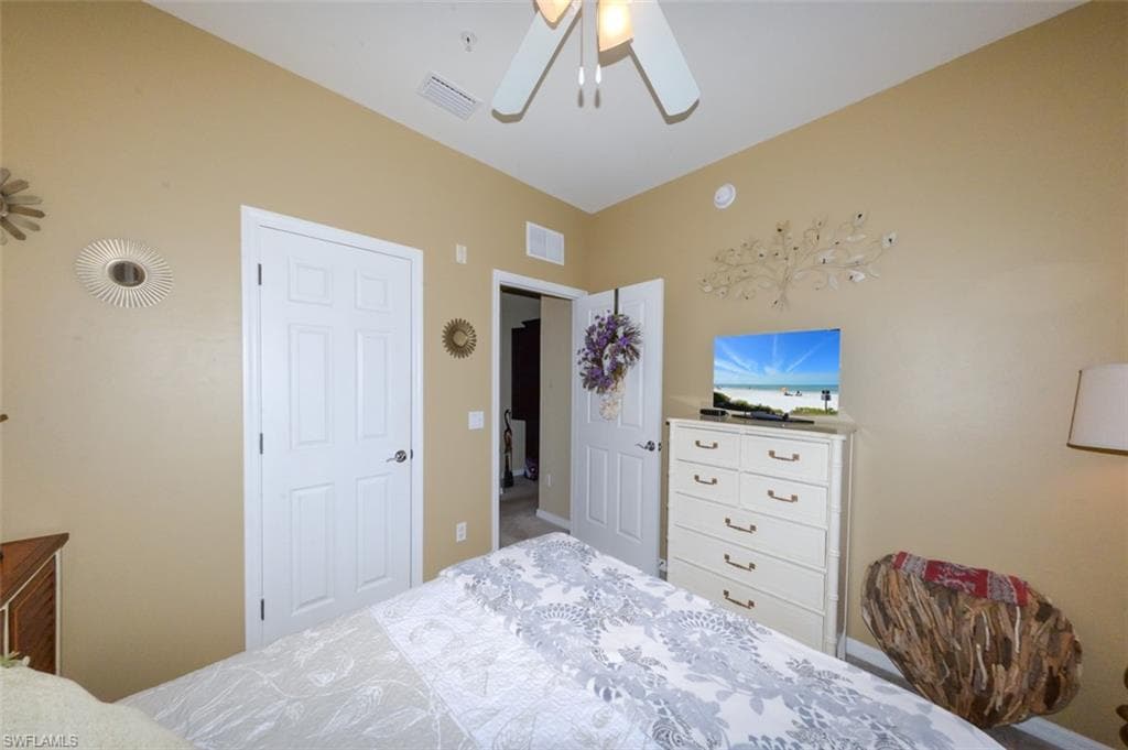 Spacious Guest bedroom with Plantation shutters.