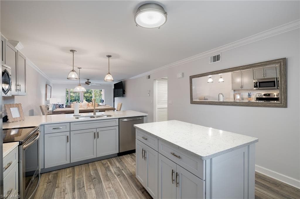 3021 Sandpiper Bay CIR E106 photo 1 of 26