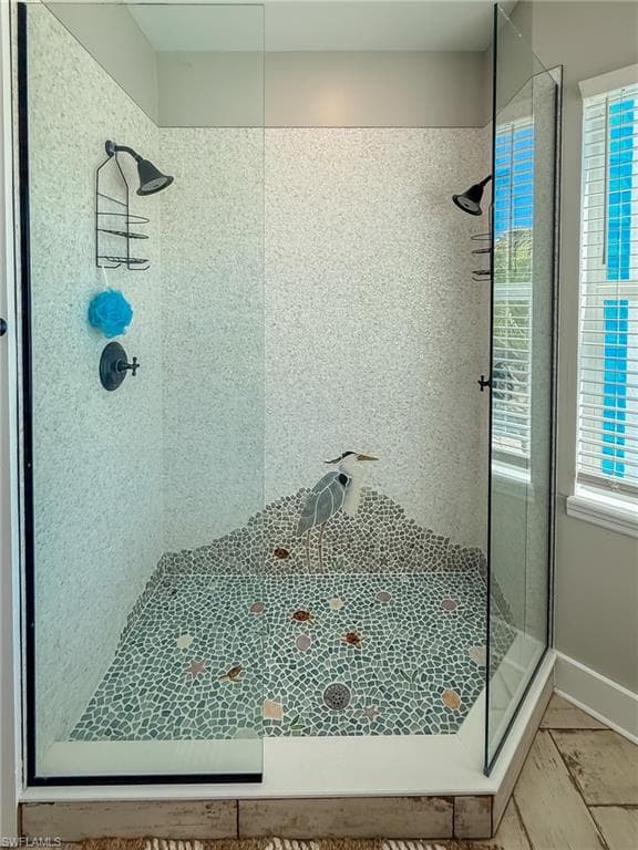 Full bath with a shower stall