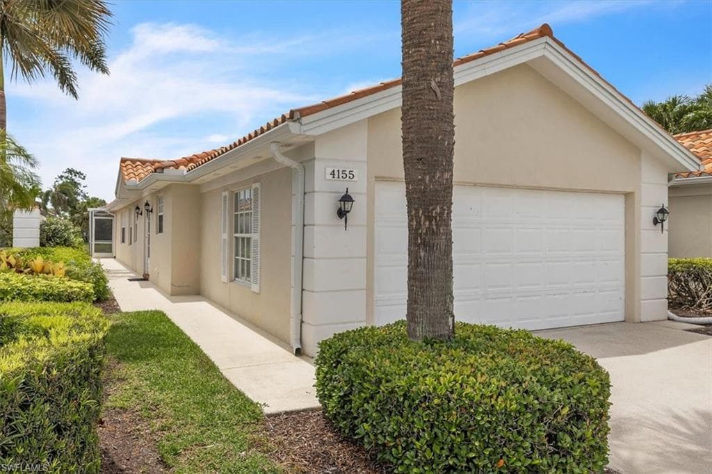2018 roof, 2 car garage, great middle of the community location!