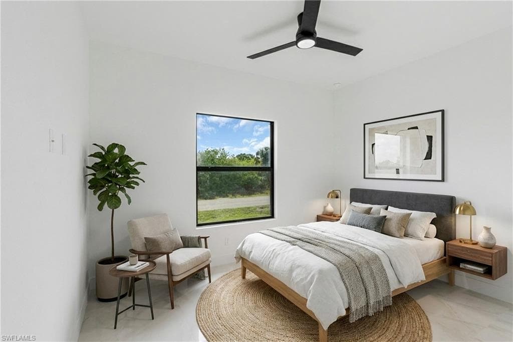 Virtually Staged. Bright room featuring a black framed window, recessed lighting, and a contemporary ceiling fan