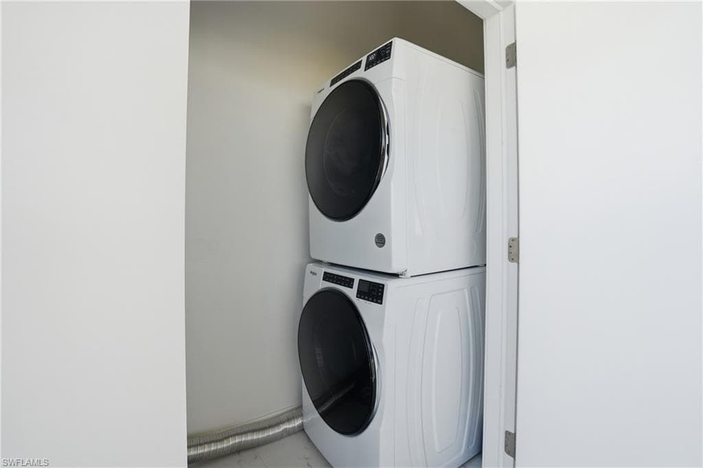 Washroom with stacked washer / drying machine - Virtually Edited Image