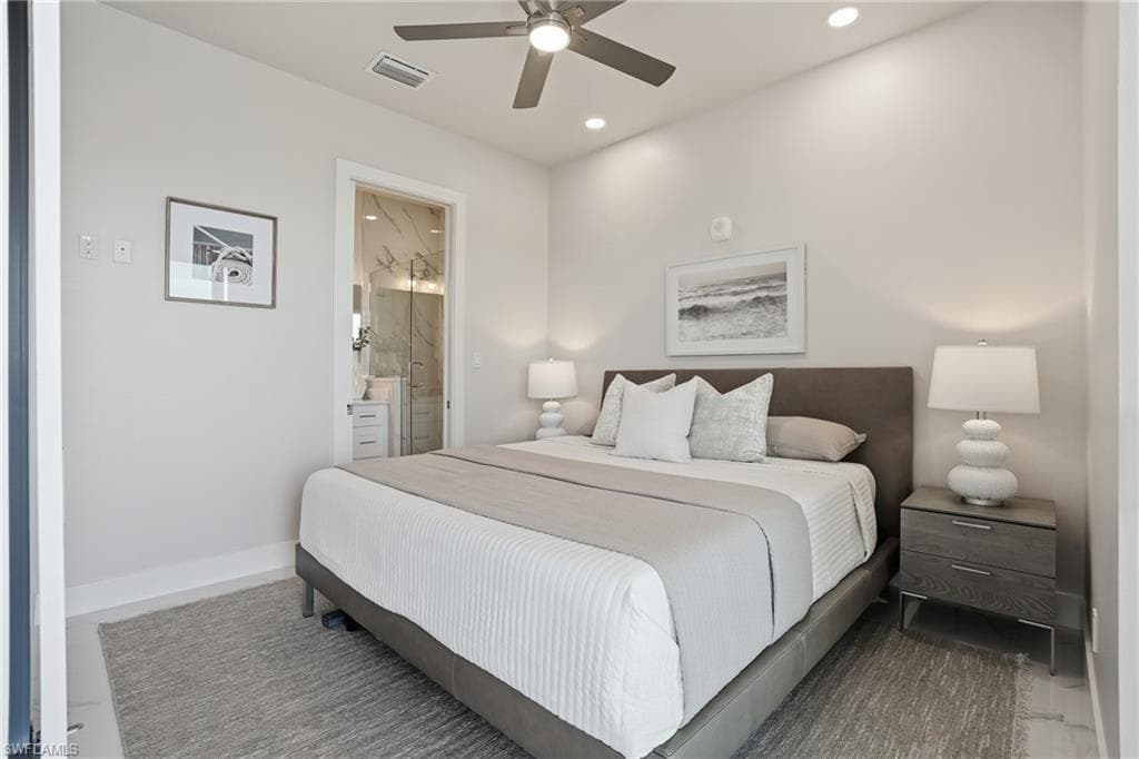 Bedroom with a ceiling fan, ensuite bathroom, and recessed lighting - Virtually Edited Image
