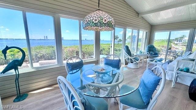 Sunroom with sliding windows and River view