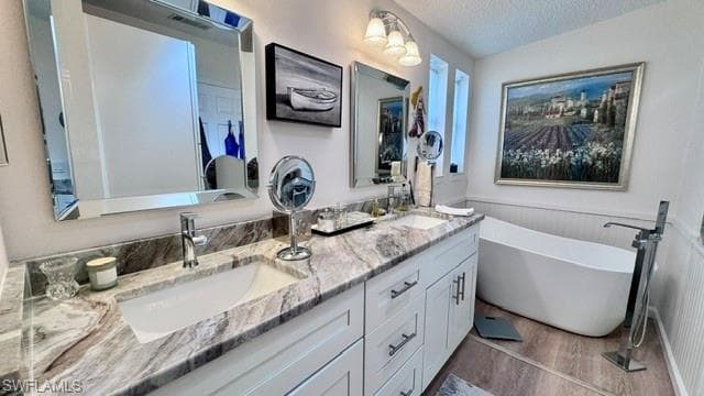 Dual vanity featuring under-mount sinks, chrome faucets, and a marble-patterned countertop