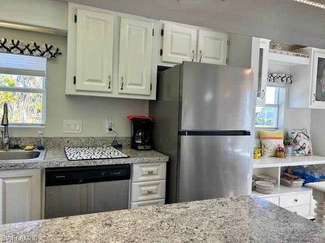 STAINLESS STEEL DISHWASHER AND REFRIGERATOR