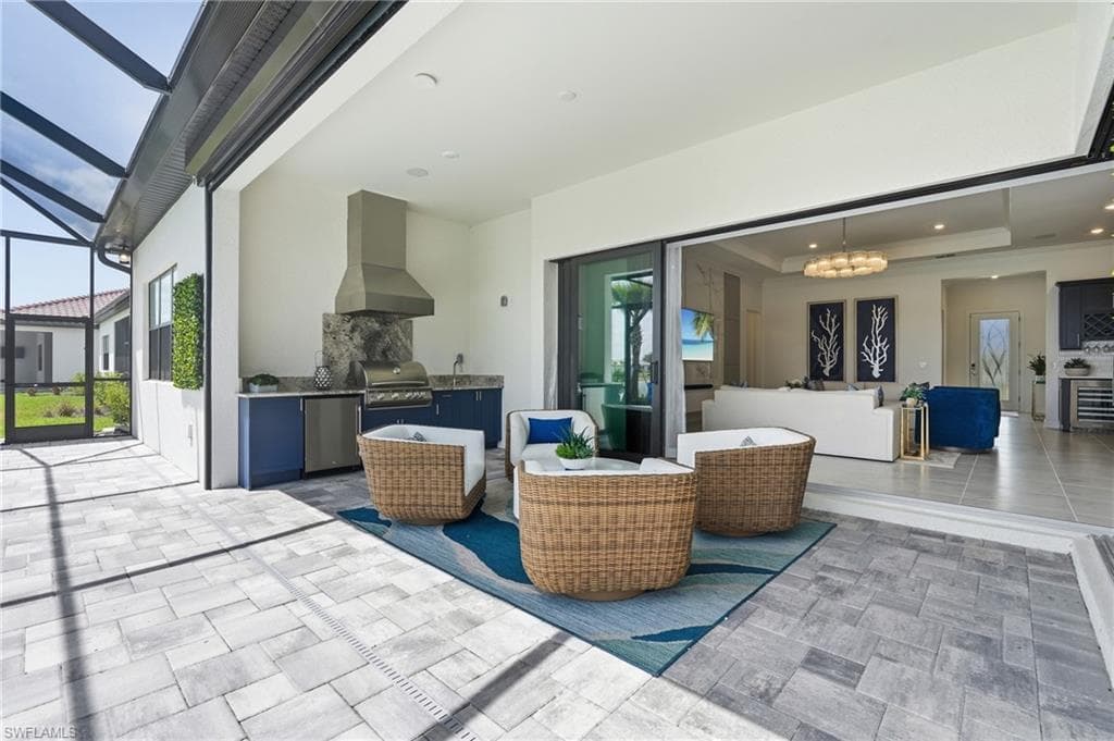 Newly Installed Outdoor Kitchen- Outdoor Cabinetry BBQ Grill & Vented Hood, SS Refrigerator and Sink