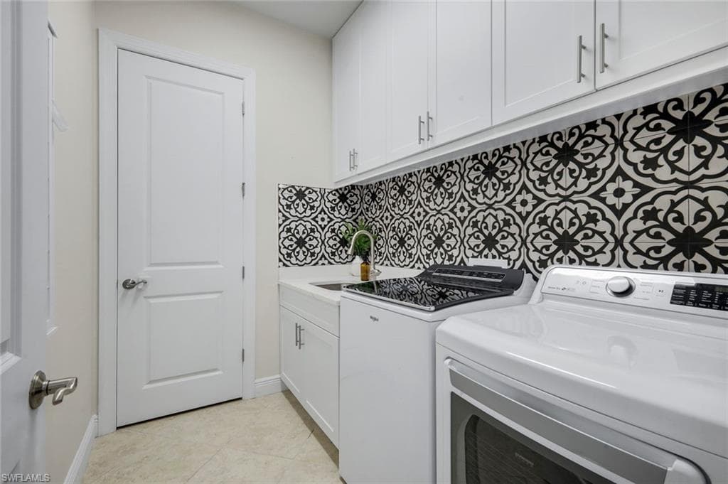 Laundry Room with Cabinetry & Sink