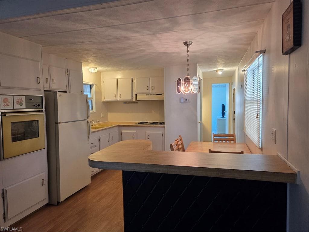 You’re eat-in kitchen features a breakfast bar and all appliances.