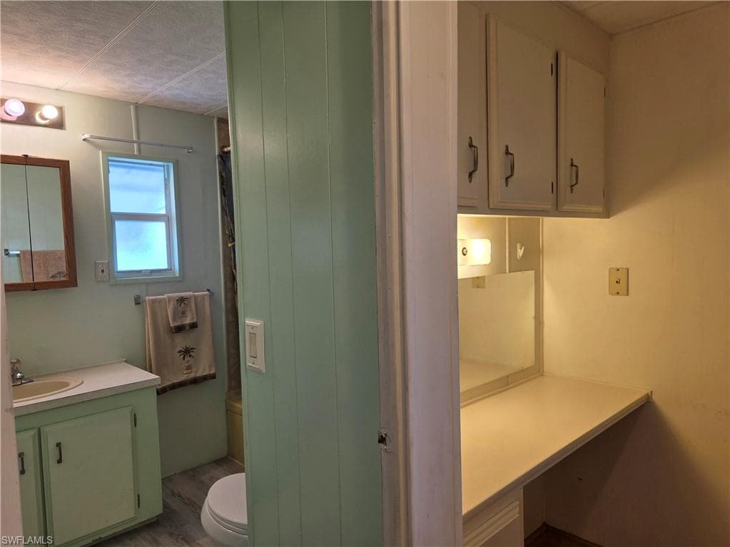 Hall bathroom and planning desk in the hallway.