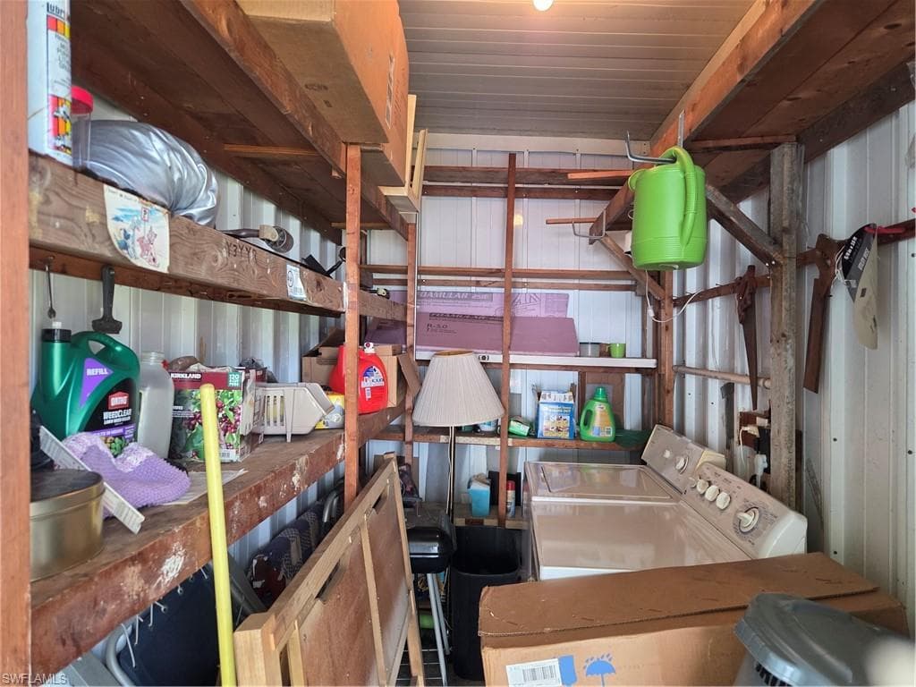 Washer & Dryer are located in the storage shed