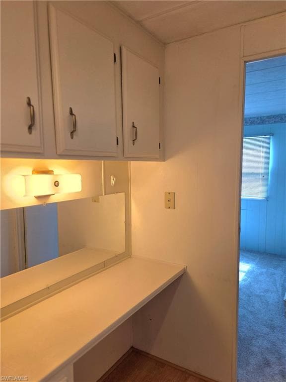 Built-in planning desk and cabinets. Great for office space or crafts!