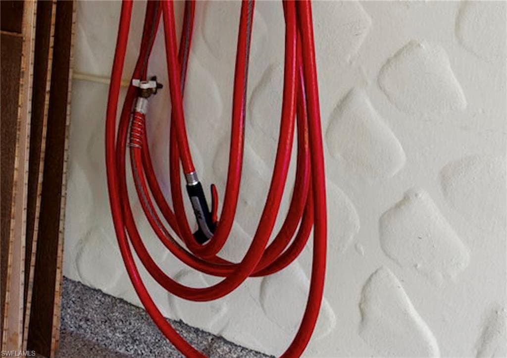 Garage hose bib