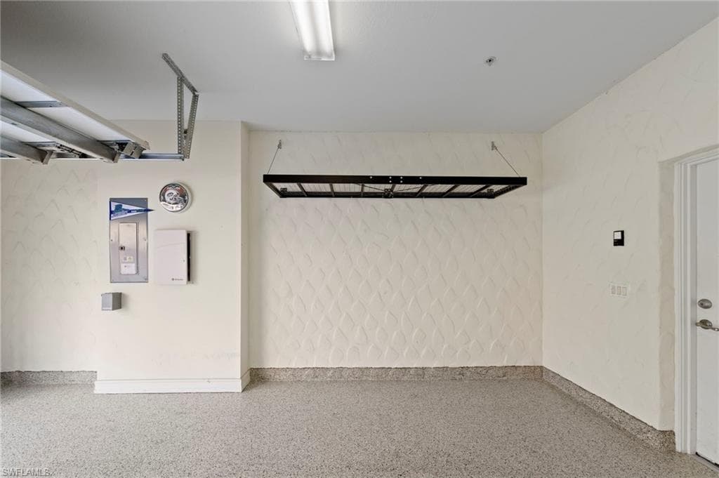 NEW DEDICATED GENERATOR OUTLET (2024), NEW HEAVY DUTY EPOXY FLOOR (2024), NEW HANGING STORAGE SHELVES (2021)