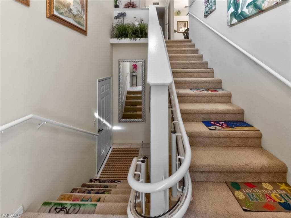 Foyer to front entrance and Garage door entrance with electric stair chair lift.