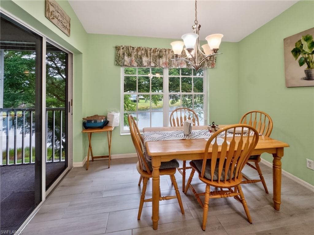 Eat in kitchen area with lake views. Slider to screened lanai