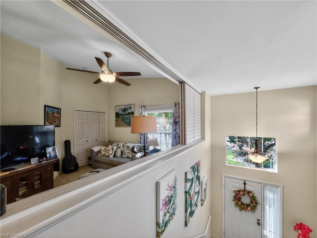 View of sliding shutters allowing more natural light to Den/Bedroom. 3rd Bedroom currently used as a Den.