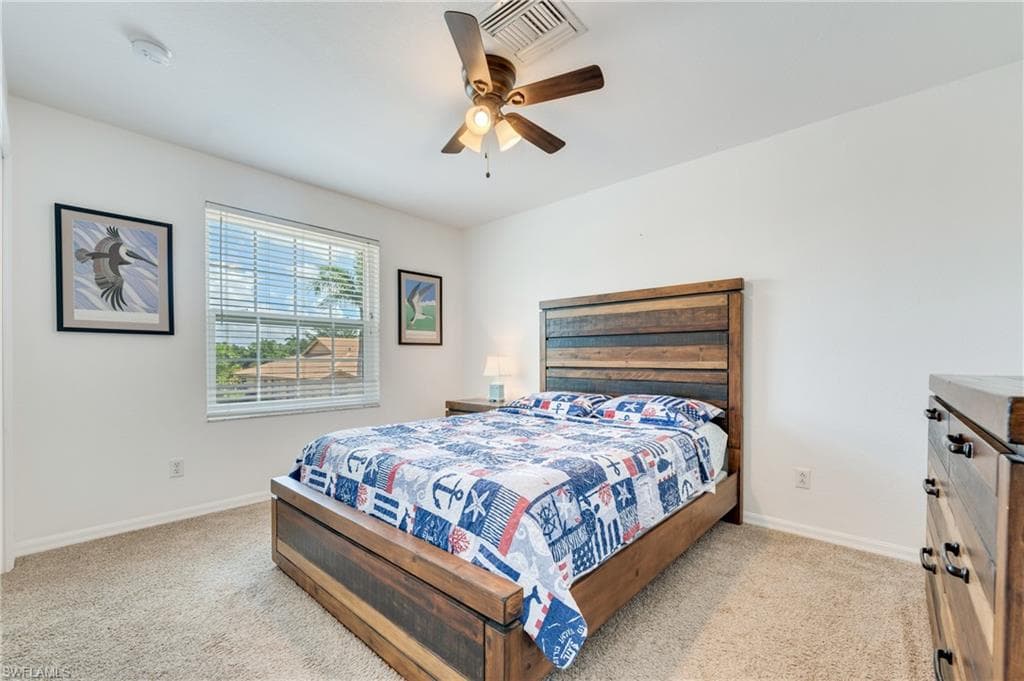 Carpeted guest bedroom