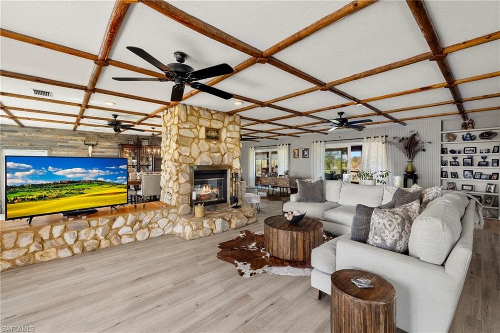 Great Room side of the woodburning Stone Fireplace