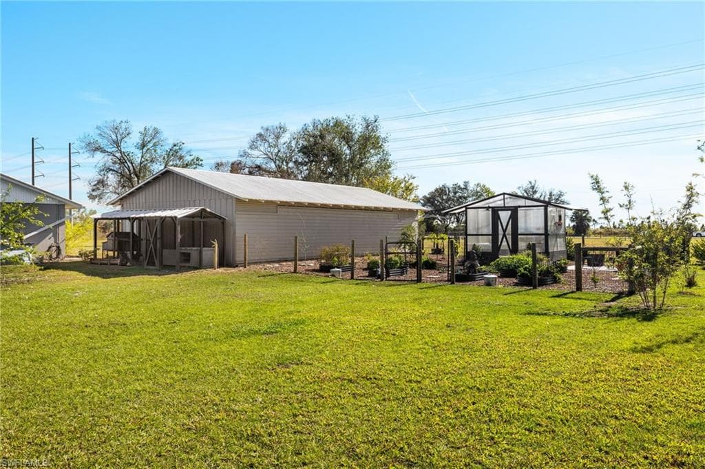 If you like fresh eggs, please note the chicken coop at the rear of the huge storage building - ready for your new flock.