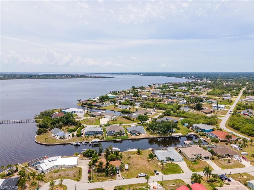 Waterfront residential community featuring a river, canals, and docks