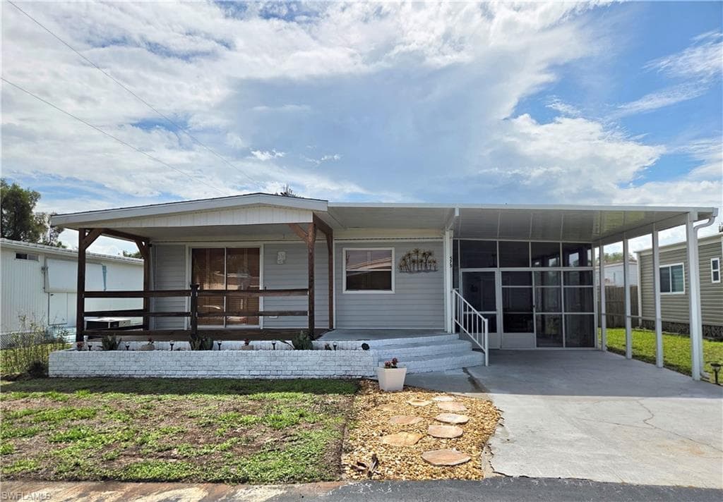Lovingly maintained & Beautifully furnished double-wide features 2 Bedrooms & 2 Full Bathrooms